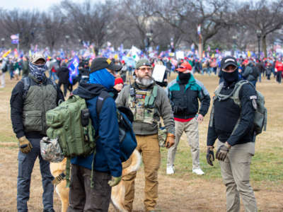 Men belonging to the Oath Keepers wearing military tactical gear attend the "Stop the Steal" rally on January 6, 2021, in Washington, D.C.