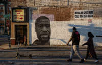 A mural depicting George Floyd that was painted by Dustin Emory in 2020 is shown downtown on March 8, 2021, in Atlanta, Georgia.