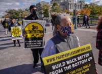 People demonstrate at the U.S. Capitol during the MoveOn and Poor People's Campaign's Build Back Better Action on November 15, 2021, in Washington, D.C.