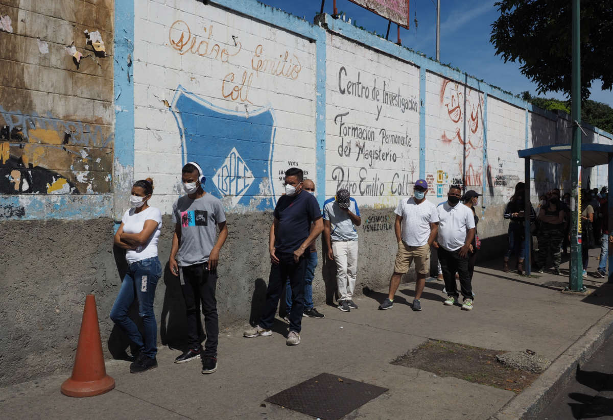 Voters wait to vote at the Liceo Pedro Emilio Coll in the Coche Parish in Caracas Venezuela during elections on November 21, 2021.