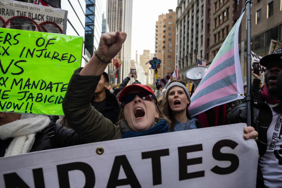 Demonstrators march during an anti-mandate protest against the COVID-19 vaccine as part of a "Global Freedom Movement" in New York on November 20, 2021.