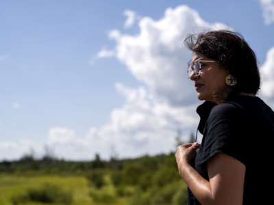 Rep. Rashida Tlaib looks over the headwaters of the Mississippi River where the Line 3 Pipeline is being constructed on September 4, 2021, in Park Rapids, Minnesota.
