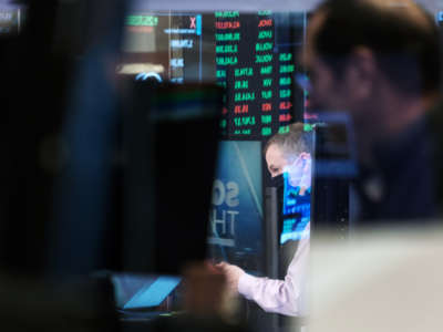 Traders work on the floor of the New York Stock Exchange (NYSE) on November 15, 2021, in New York City.