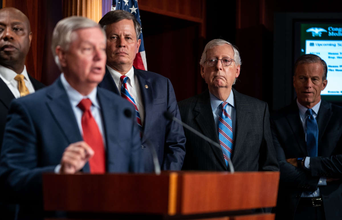 From left, Sen. Tim Scott, Sen. Lindsey Graham, Sen. Steve Daines, Senate Minority Leader Mitch McConnell, and Sen. John Thune hold a news conference on Capitol Hill on July 21, 2021.