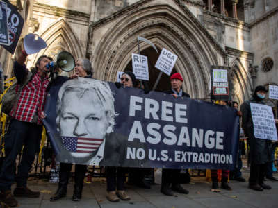 Supporters of Julian Assange outside the Royal Courts of Justice on December 10, 2021, in London, England.