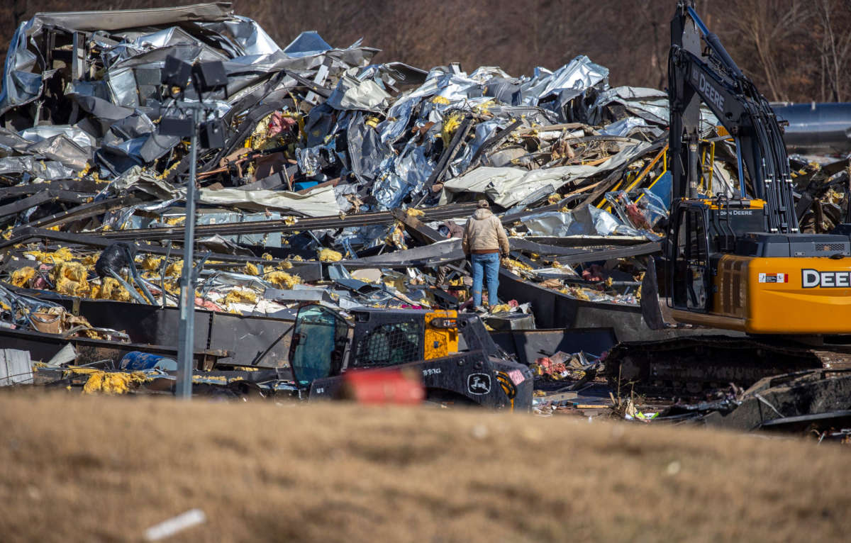 Search are rescue efforts are underway at Mayfield Consumer Products, a candle factory, on December 11, 2021, after a tornado traveled through the region the previous night.