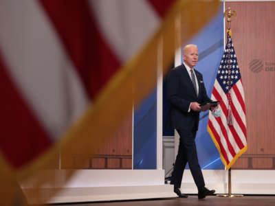 President Joe Biden takes the stage to deliver closing remarks for the White House's virtual Summit For Democracy in the Eisenhower Executive Office Building on December 10, 2021, in Washington, D.C.