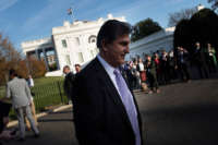 Sen. Joe Manchin walks the grounds of the White House on November 18, 2021, in Washington, D.C.