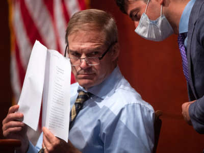 Rep. Jim Jordan speaks to an aid during a House Judiciary Committee markup on Capitol Hill on June 17, 2020, in Washington, D.C.