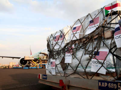A shipment of COVID-19 vaccines sent to Sudan by the COVAX vaccine-sharing initiative are unloaded at the airport in the capital Khartoum, on October 6, 2021.