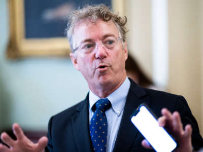 Sen. Rand Paul speaks with a reporter in the Ohio Clock Corridor in the Capitol on September 30, 2021.