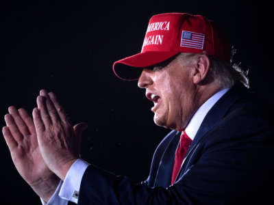 President Donald Trump leaves after speaking during a Make America Great Again rally at Miami-Opa Locka Executive Airport in Opa Locka, Florida, on November 2, 2020.