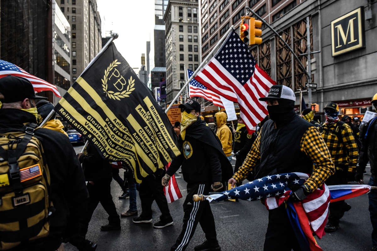 Members of the Proud Boys march in Manhattan against vaccine mandates on November 20, 2021, in New York City.