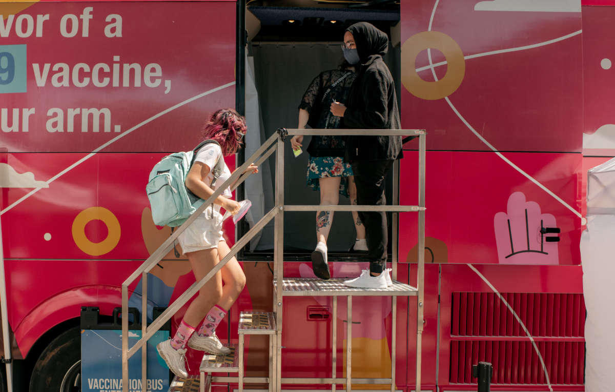 A teenager enters a pop-up COVID-19 vaccine site on June 5, 2021, in the Jackson Heights neighborhood in the Queens borough in New York City.