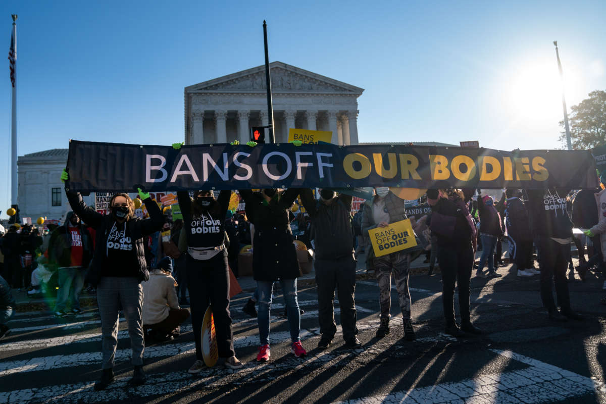 Abortion rights advocates demonstrate in front of the Supreme Court on December 1, 2021, in Washington, D.C.