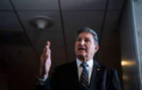 Sen. Joe Manchin speaks to reporters outside his office on Capitol Hill on January 4, 2022, in Washington, D.C.