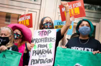 Demonstrators rally in front of PhRMA's Washington office to protest high prescription drug prices on September 21, 2021.