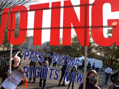 Activists take part in a voting rights protest in front of the White House on November 17, 2021, in Washington, D.C.