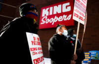 King Soopers grocery store workers walk the picket line as they strike at more than 70 stores across the Denver metro area on January 12, 2022, in Denver, Colorado.