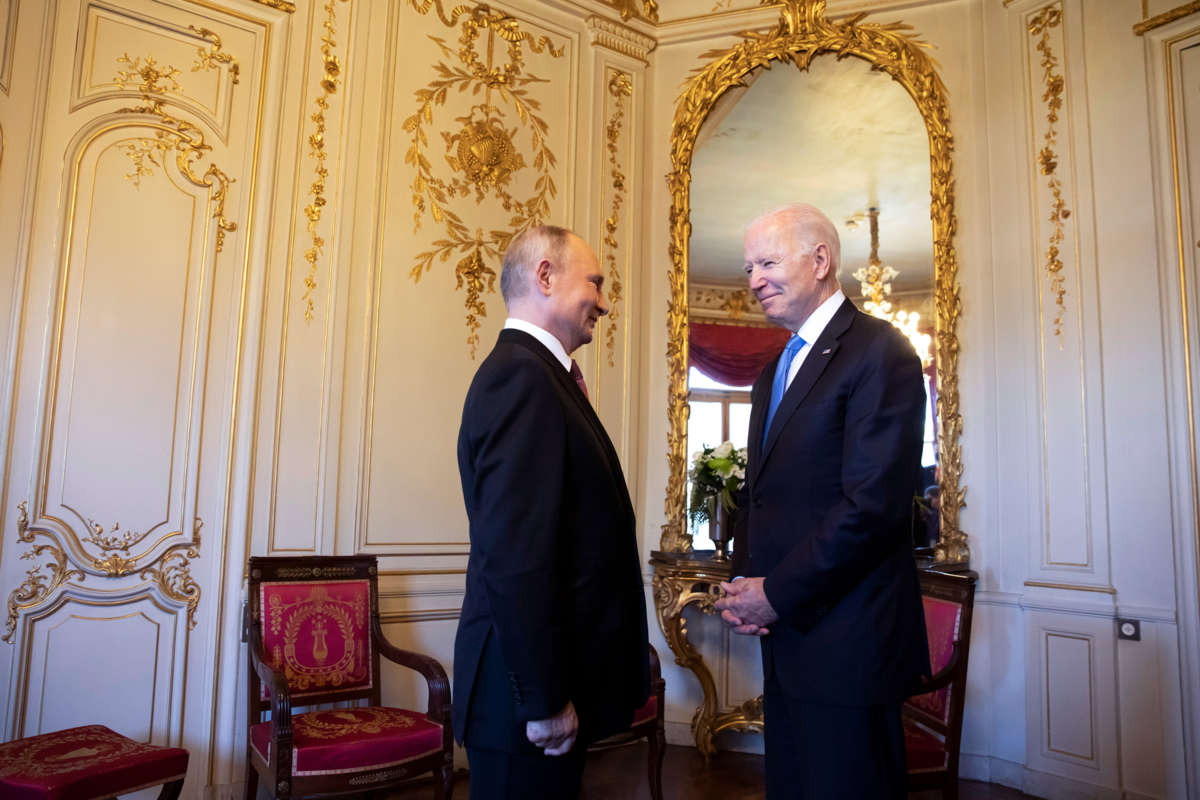 Joe Biden and Vladimir Putin exchange strained smiles