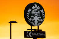 A Starbucks drive-through sign is pictured on January 18, 2022, in Cardiff, Wales.