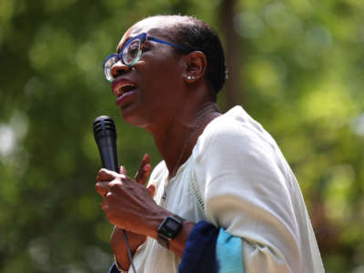Congressional candidate Nina Turner speaks to a crowd of volunteers before a Get Out the Vote canvassing event on July 30, 2021, in Cleveland Heights, Ohio.