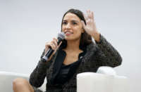 Rep. Alexandria Ocasio-Cortez speaks during an event at the U.S. Climate Action Centre during COP26 on November 9, 2021, in Glasgow, Scotland.