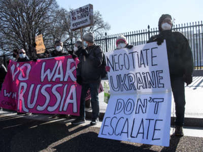 Antiwar activists demonstrate against the escalating conflict with Russia in Ukraine in front of the White House in Washington, D.C., on January 27, 2022.