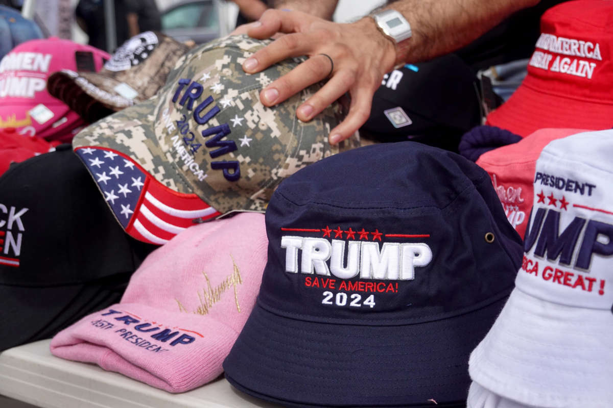 Merchandise is offered for sale before the start of a rally with former President Donald Trump at the Iowa State Fairgrounds on October 9, 2021, in Des Moines, Iowa.