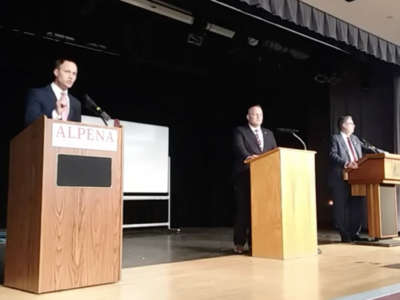From left, former speaker Tom Lenard, Rep. Ryan Berman and Matthew DePerno take part in the GOP attorney general candidate debate at Alpena Community College in Alpena, Mighigan, on February 18, 2022.