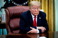 President Donald Trump sits a the Resolute Desk in the Oval Office at the White House on May 1, 2020, in Washington, D.C.