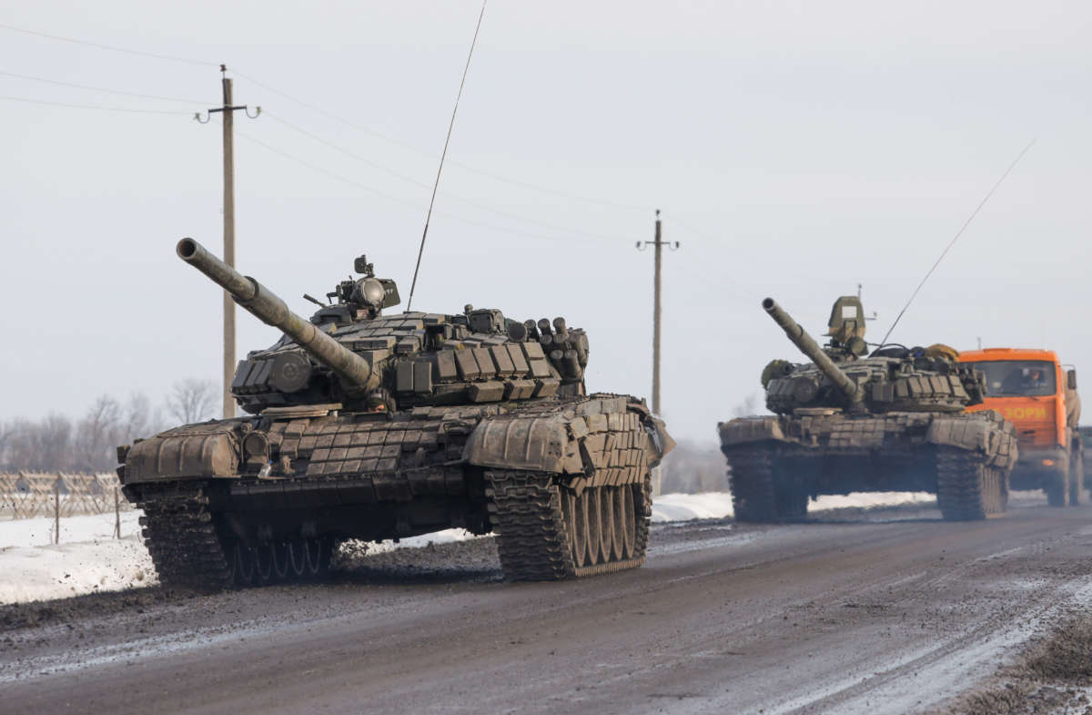 A column of Russian military vehicles is seen near the village of Oktyabrsky, Belgorod Region, near the Russian-Ukrainian border, on February 26, 2022.