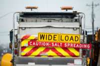 A Maryland Department of Transportation snowplow loaded with road conditioning salt in Wye Mills, Maryland, on February 17, 2021.