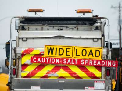 A Maryland Department of Transportation snowplow loaded with road conditioning salt in Wye Mills, Maryland, on February 17, 2021.