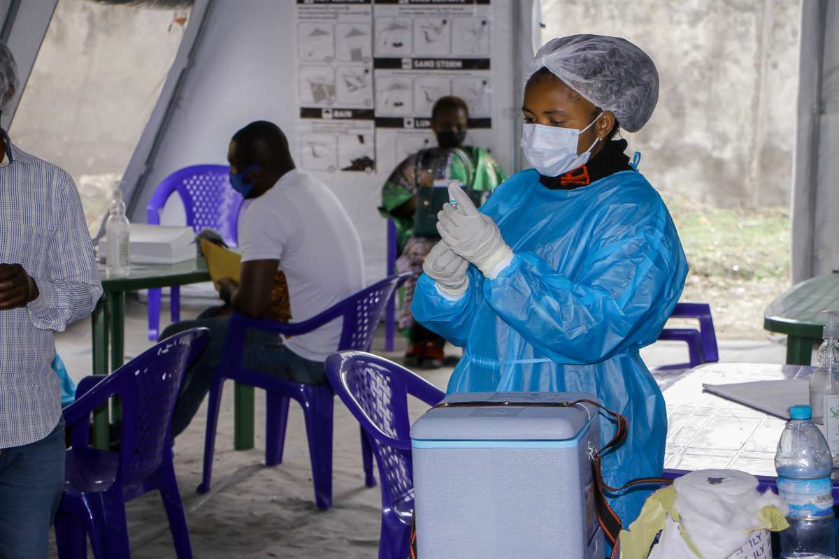 A medical worker prepares a dose of the COVID-19 vaccine at a vaccination center in Goma, Democratic Republic of the Congo, on August 21, 2021.