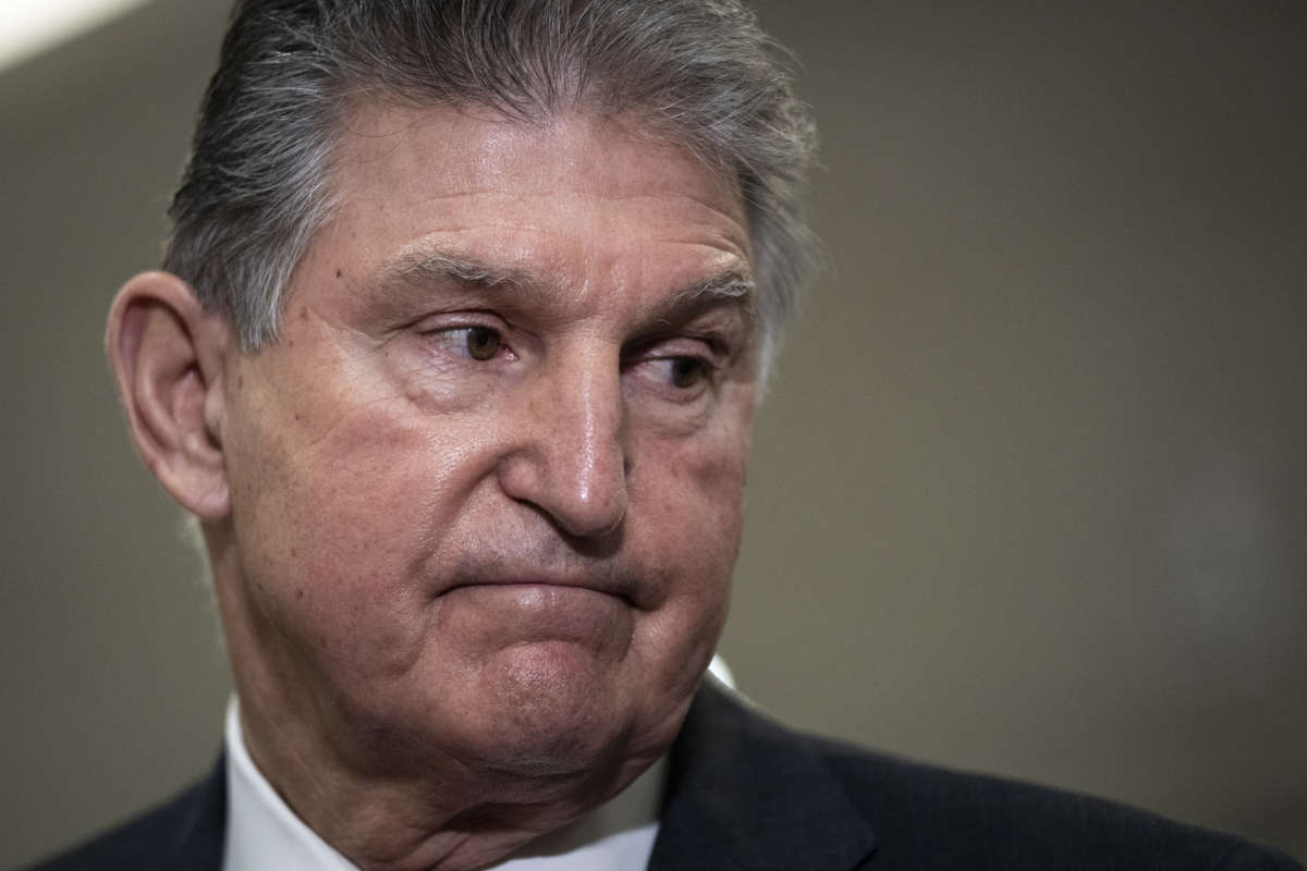 Sen. Joe Manchin speaks to reporters after a closed door briefing at the U.S. Capitol Building on February 3, 2022, in Washington, D.C.