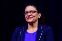Rep. Rashida Tlaib takes part in a panel discussion during Netroots Nation progressive grassroots convention in Philadelphia, Pennsylvania, on July 13, 2019.