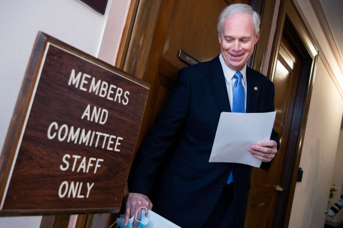 Chairman Ron Johnson arrives for a Senate Homeland Security and Governmental Affairs Committee hearing in Dirksen Building on December 16, 2020.