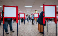 Voters stand at ballot boxes and cast their votes at Fairdale High School on November 3, 2020, in Louisville, Kentucky.