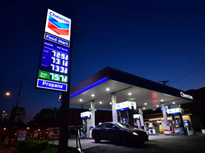 Gas prices of more than $7.00 per gallon are posted at a downtown Los Angeles gas station on March 9, 2022.