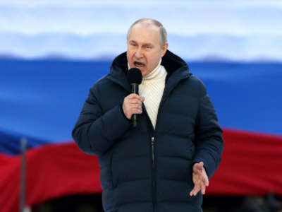 Russian President Vladimir Putin speaks during a concert marking the anniversary of the annexation of Crimea, on March 18, 2022, in Moscow, Russia.