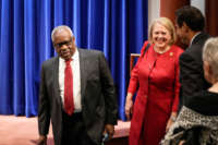 Associate Supreme Court Justice Clarence Thomas and his wife, conservative activist Virginia Thomas, arrive at the Heritage Foundation on October 21, 2021, in Washington, D.C.