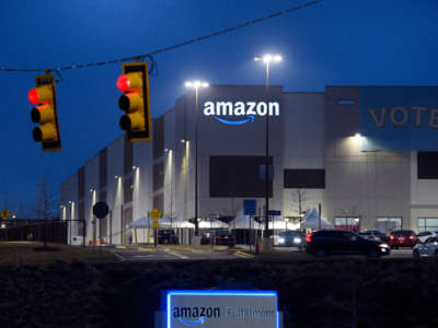A Vote banner hangs at an Amazon fulfillment center early on March 27, 2021, in Bessemer, Alabama.