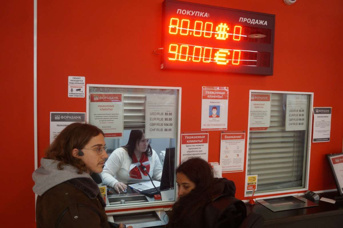 People in Russia visit local bank branch