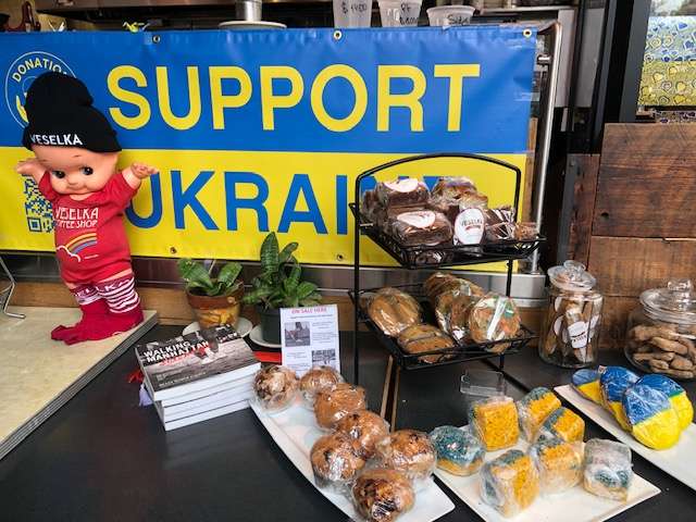 Veselka, a Ukrainian restaurant in New York City, displays shows of solidarity with the Ukrainian people in its windows.