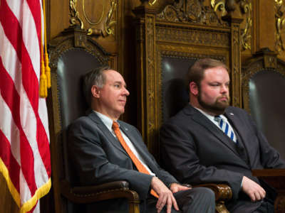 Wisconsin Assembly Speaker Robin Vos, left, and Speaker Pro Tempore Tyler August listen as Democrats address the Assembly during a legislative session on December 4, 2018, in Madison, Wisconsin.