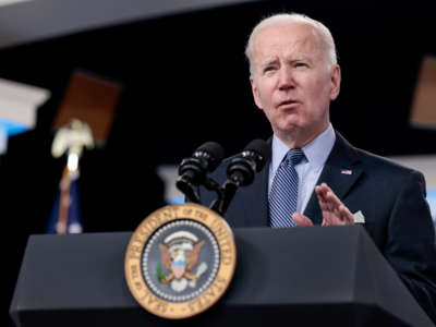 President Joe Biden gestures as he delivers remarks in the South Court Auditorium on March 30, 2022, in Washington, D.C.