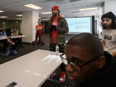 Christian Smalls, center, speaks before attendees at an Amazon Labor Union event in New York City on March 11, 2022.