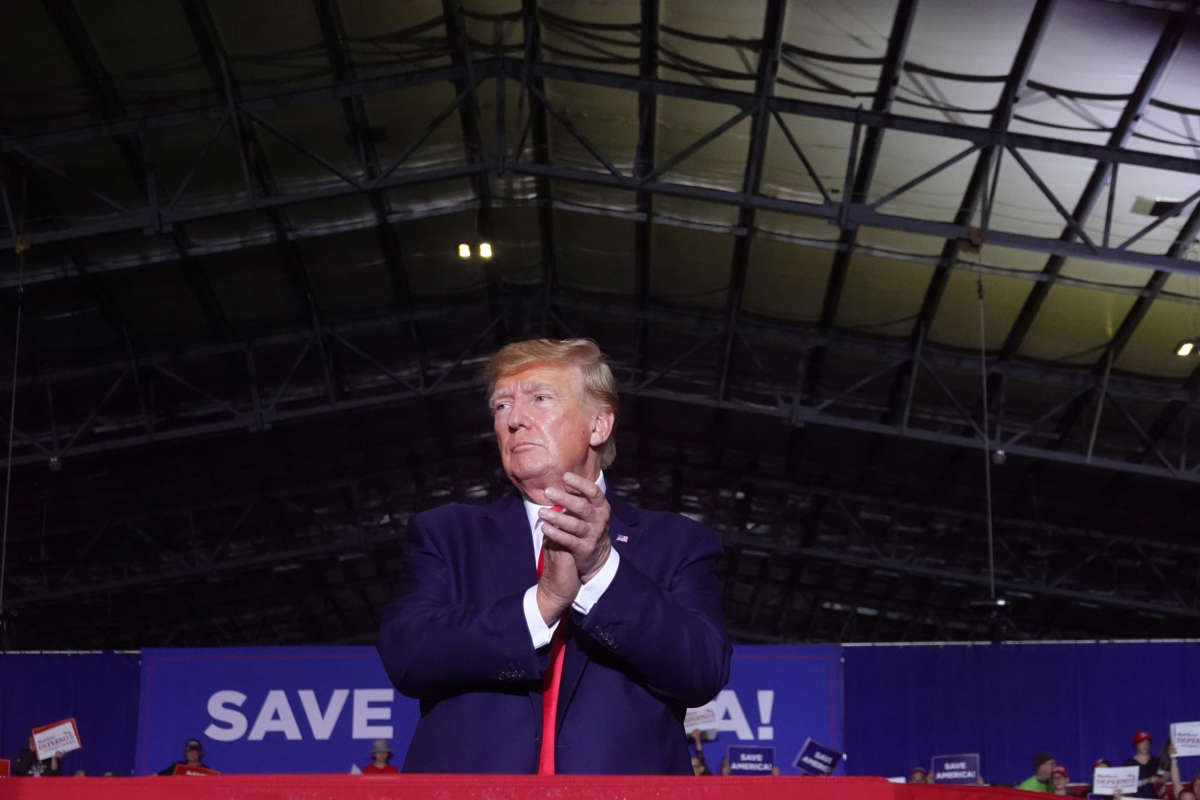 Former President Donald Trump speaks to supporters at a rally on April 2, 2022, near Washington, Michigan.
