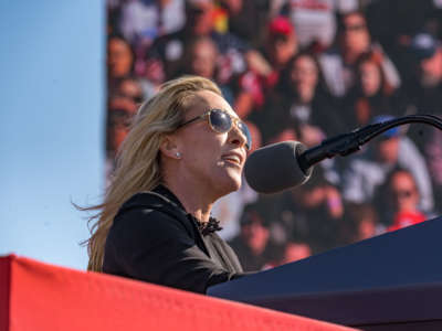 Rep. Marjorie Taylor Greene speaks to supporters of former President Donald Trump at the Banks County Dragway on March 26, 2022, in Commerce, Georgia.